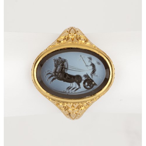 A Gold Finger-Ring Set with a Nicolo Intaglio of Eros Driving a ‘Biga’ Two-Horse Chariot